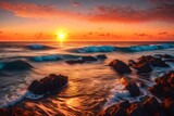 Fototapeta Zachód słońca - A stunning sunset over a tranquil ocean