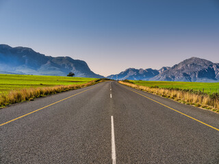 winding road through beautiful valley and mountain, mitchell's pass, ceres, western cape, south afri