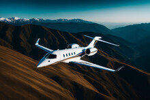 Private Jet Flying  With Mountains In The Background.