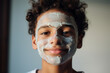 Care for boys and Blemish Solutions concept. Boy applying clay facial mask. Digital Ai