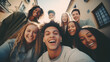 © Rexon Stock - Big group of cheerful young friends taking selfie portrait. Happy people looking at the camera smiling. Concept of community, youth lifestyle and friendship