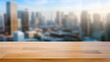 © oksa_studio - Wood table top on blur cityscape background - can be used for display or montage your products. High quality photo