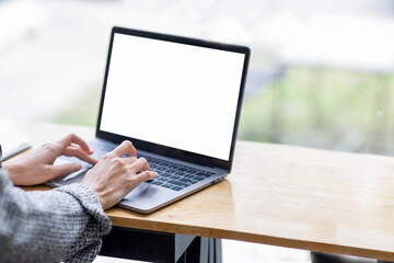 Asian girl school student e learning distance training course study work at home office. Ethnic young woman watching online education webinar using laptop. Over shoulder close up mock up screen view