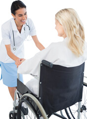 Sticker - Digital png photo of caucasian female doctor and patient in wheelchair on transparent background