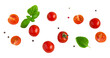 Cherry tomatoes with basil leaves cut out on transparent background