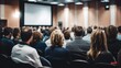© visoot - Rear view of people in audience at the conference hall, Speaker giving a talk in conference hall at business event.