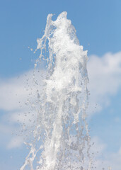 Sticker - Fountain splashes against the blue sky. Background