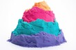 Pile of kinetic sand of various colors isolated on white background