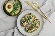 Avocado toast  with mushrooms, feta cheese and microgreens