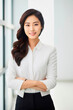 asian businesswoman in front of bright background