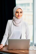 © the_lightwriter - muslim businesswoman in an office