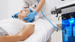 © wedmoments.stock - Cosmetologist doing hydrafacial treatment on woman face in beauty clinic