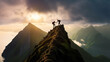 © IBEX.Media - Hiker helping friend reach the mountain top in spectacular landscape