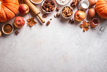 Wall Mural - Autumn baking background with pumpkins, apples and nuts