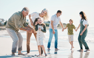 Poster - Grandparents, kids and big family with play at beach, comic laugh or bonding for love, sunshine or excited on vacation. Men, women and children by sea, waves or happy for holiday for summer in Spain