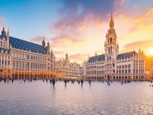 Grand Place In Old Town Brussels Belgium City With The Beautiful Sunrise.