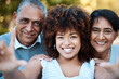 © Anela/peopleimages.com - Selfie, portrait and woman with senior parents in an outdoor park for adventure, holiday or weekend trip. Happy, smile and young female person taking picture with her elderly mom and dad from Mexico.