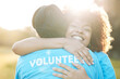 © Anela/peopleimages.com - Nature, community volunteer and happy people hug, support and NGO team celebrate environment care. Teamwork, nonprofit service and eco friendly team happy, embrace and help with park outreach project