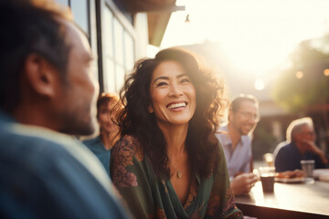 Senior Asian women enjoy lively conversations and laughter,celebrating togetherness and friendship, savoring food and coffee in a beautiful garden cafe,