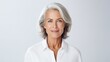 © WS Studio 1985 - Portrait of senior woman on white background. generative ai