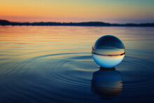 Lensball - Sunset Over The Lake -   Landscape - Beautiful - Silhouette  - Sunrise Sea - Colorful - Reed - Clouds - Sky - Sundown - Sun	- Crystal Ball - Background - Water - Concept - Summer