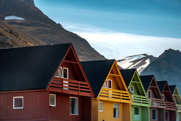 Colorful old coal mining houses on the hills of Longyearbyen, the world's northernmost settlement, Spitsbergen, Svalbard, Norway