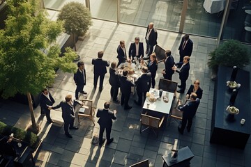 Happy business team shaking hands with clients in the office Smiling executive team making deals with customers and shaking hands at work inside the office conference room.