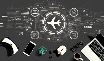 Wall Mural - Flight ticket booking concept with electronic gadgets and office supplies - flat lay
