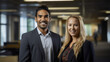 © Stock'd  - portrait of poc business man with blonde business woman  in office representing workplace diversity
