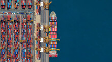 Industrial Import-export Port Prepare To Load Containers. Aerial Top View Container Ship In Export And Import Global Business And Logistic. Global Transportation And Logistic Business.