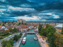 Annecy City Center Panoramic Aerial View Over The Old Town, Castle, Thiou River And Mountains Surrounding The Lake. Annecy Is Known As The Venice Of The French Alps
