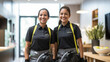 © Studio Nova - Happy multicultural cleaners looking at camera while standing with cleaning supplies in office