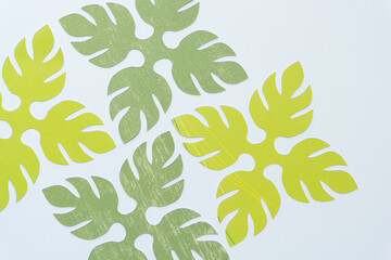 Sticker - four quad-palmette decor shapes machine-cut from paper and arranged on blank paper