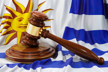 Wall Mural - Uruguayan law and justice concept. Wooden gavel on flag of Uruguay, 3D rendering