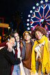 © Xavier Lorenzo - Outside winter portrait of happy young group of people smiling at camera. Millennial diverse people enjoying vacation in London. Travel vacation and youth community concept