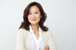 © Anne Schaum - Lifestyle portrait photography of a Vietnamese woman in her 40s against a white background