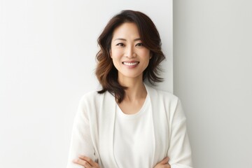 Poster - Lifestyle portrait photography of a Vietnamese woman in her 30s against a white background