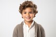 © Anne Schaum - Lifestyle portrait photography of a French child male against a white background