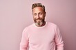 © Anne Schaum - Medium shot portrait photography of a Swedish man in his 40s against a pastel or soft colors background
