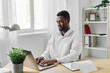 © SHOTPRIME STUDIO - man education american african laptop office job online freelancer computer workplace student