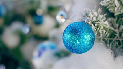 Wall Mural - Closeup shot of Christmas tree with ornament decoration, Christmas ball, lighting decor and snowflake. Happy new year, Thanksgiving, christmas eve