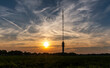 Radio tower against the background of a spectacular sunset