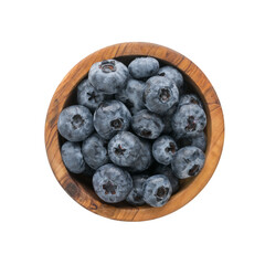 Wall Mural - Fresh washed organic blueberries ina olive wood bowl topv view isolated on white