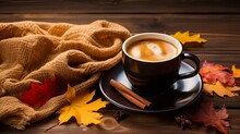 Autumn Background With Autumn Leaves, A Hot, Steaming Cup Of Coffee, And A Warm Scarf