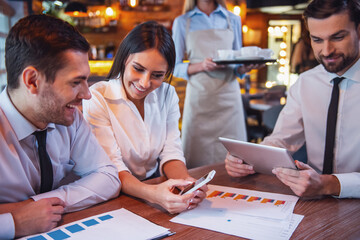 Wall Mural - Business people in cafe