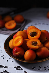 Canvas Print - Fresh ripe apricots in bowl in rustic style