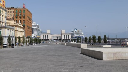 Wall Mural - Naples, Italy. View from Piazza Municipio of the Cruise Terminal where two cruise ships are docked, on a sunny summer day. 2023-07-21.