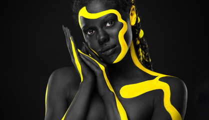Wall Mural - African black and yellow art on the models face. Download high resolution picture for music cover.