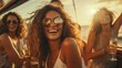 photo of Group of diverse girl friends drink champagne while having a party in yacht. Attractive young men and women hanging out, celebrating holiday vacation trip while catamaran boat sailing
