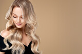 Beautiful smile  blonde model  girl  with long curly  hair . Smiling blond  woman hairstyle wavy curls .     Fashion , cosmetology ,beauty and makeup portrait
